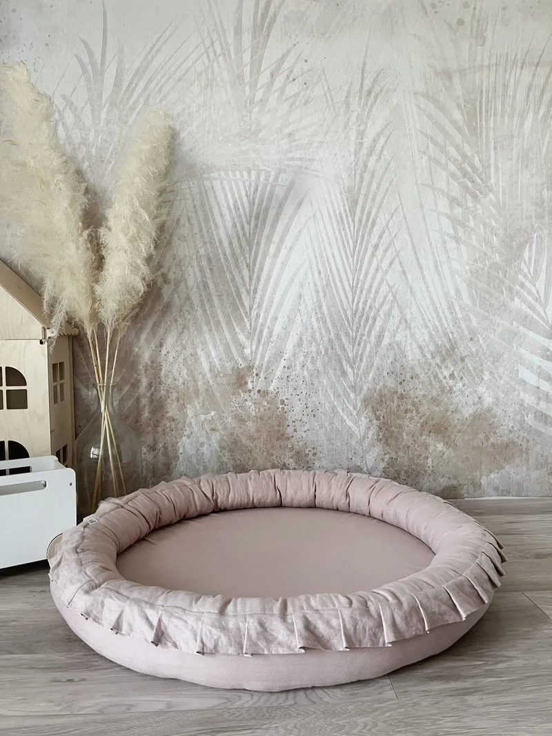 Junior Nest linne, Puderrosa