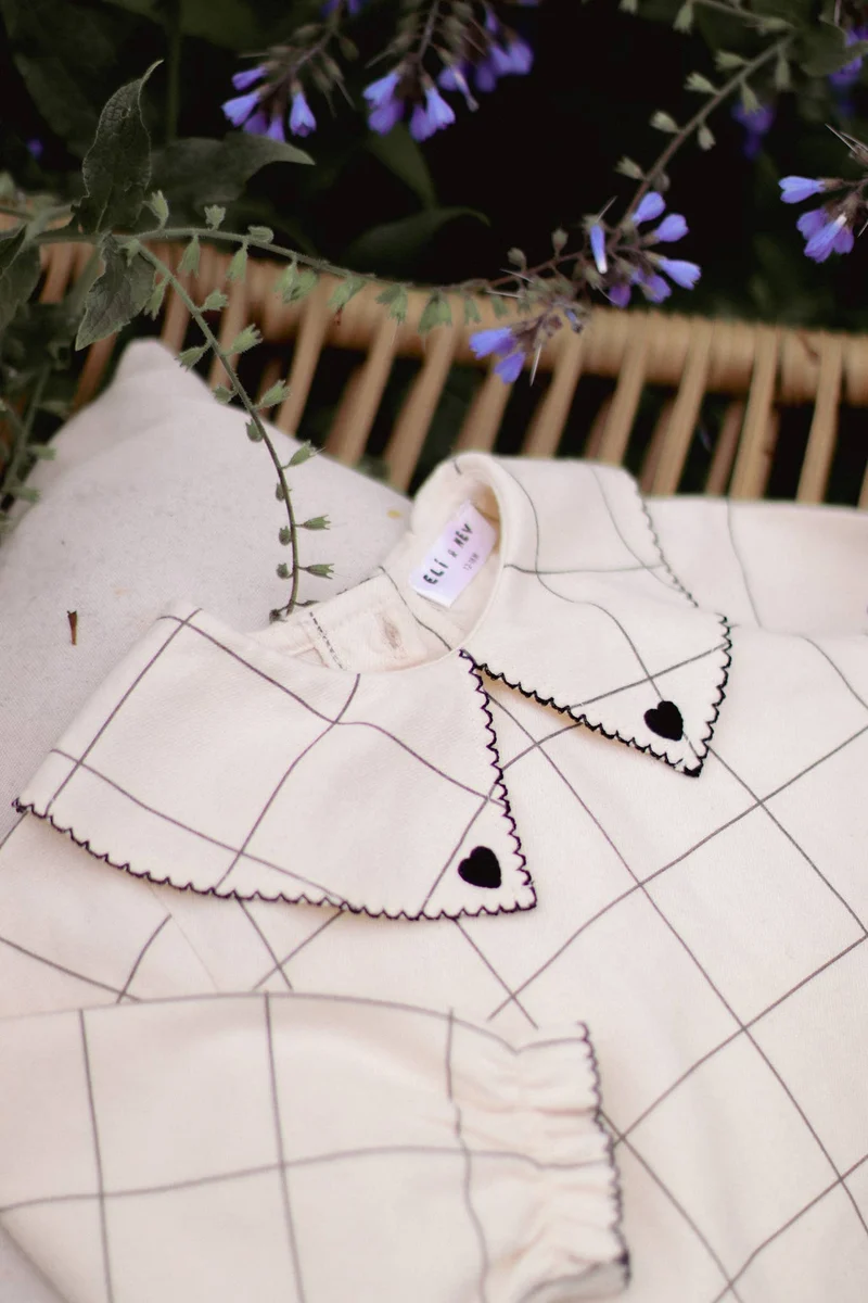 Dalila rutig babyblus i bomull