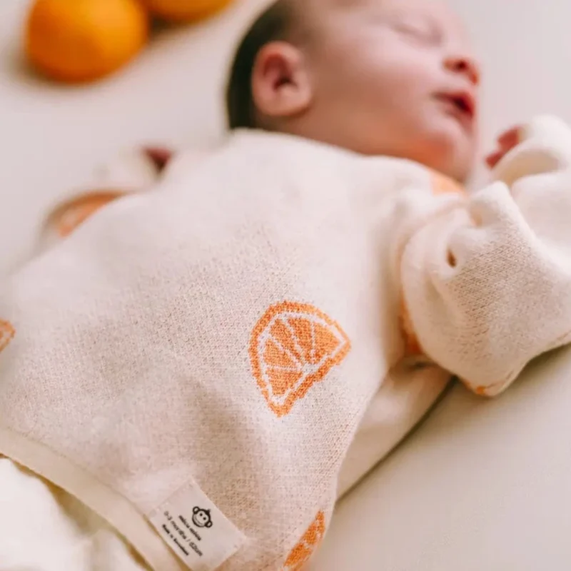 Nyföddset Oranges Garden – ekologisk bomull
